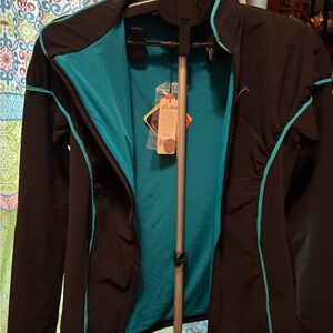 Swing dish Women's Black Golf Jacket with Teal Trim